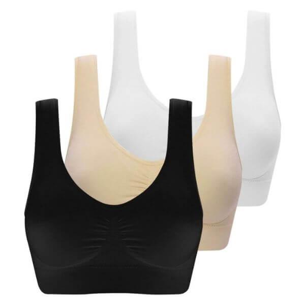 Trio de tops sem costura em preto, bege e branco para conforto e suporte feminino